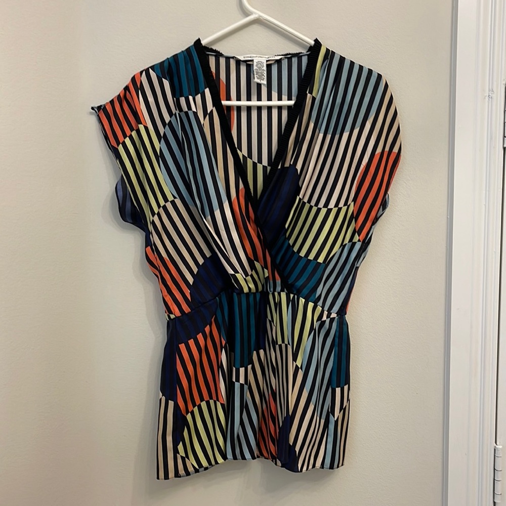 Diane von Furstenberg silk top.